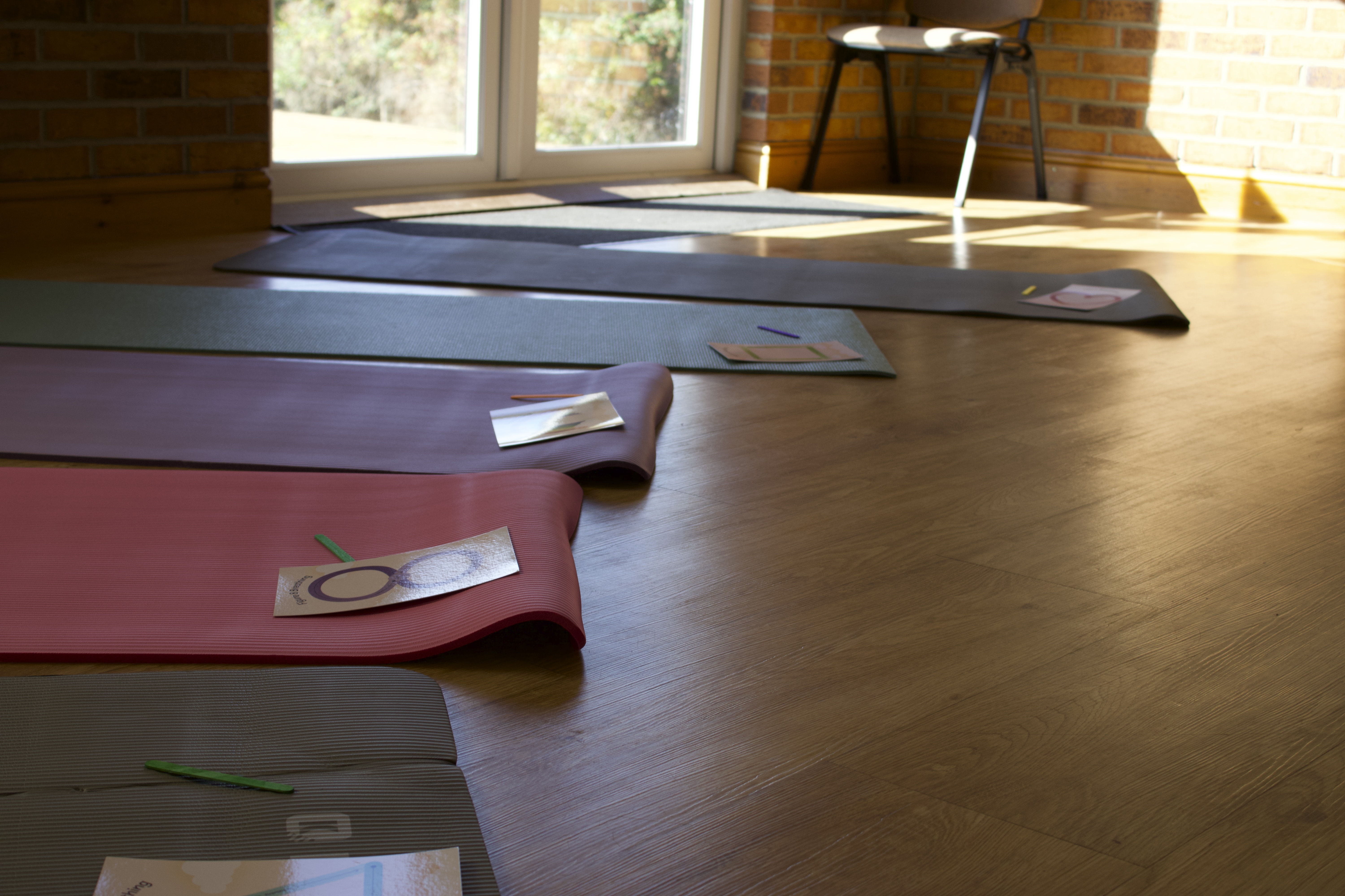 Create and Calm — yoga mats set up at Defford Village Hall